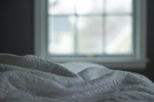 Roupa de cama branca em algodão